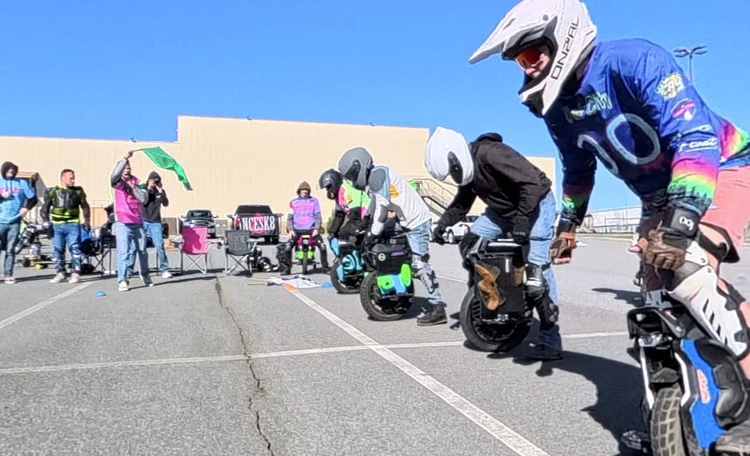 Electric unicycle rider at an event